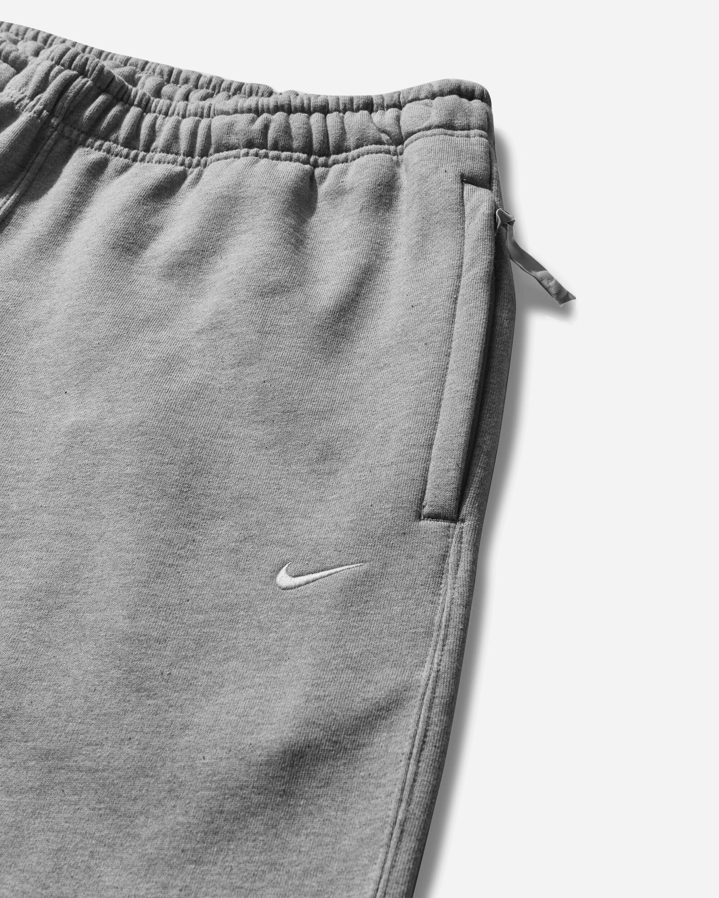 Nike M Nk Solo Swsh Flc Cf Pant Dk Grey Heather/White Pants Sweatpants DX1364-063