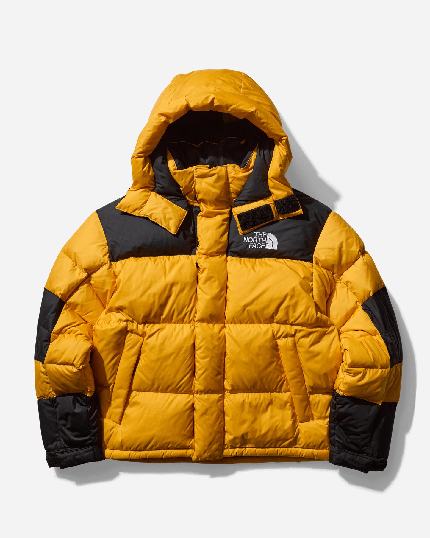 The North Face M Hmlyn Baltoro Jacket Summit Gold/Tnf Black Coats and Jackets Bomber Jackets NF0A832G 4WP